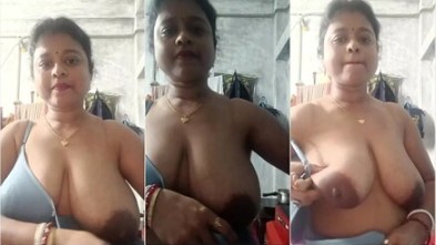 Horny Tanker Boudi Strips Pink Top and Shows Big Tits