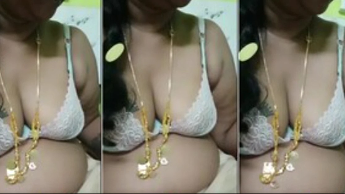 Tamil Anju leans in wearing a white lace bra on Tango live