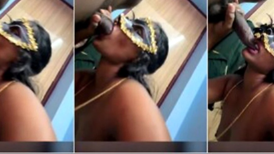 TamilCouples0 girl gives a blowjob in a gold mask