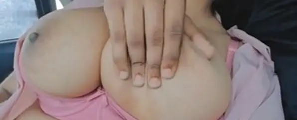 pressing girlfriend’s huge boobs inside car